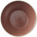 A smoky plum stoneware bowl with a white rim.