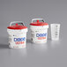 A group of Dixie Ultra Surface System Wipe dispensers, some with red lids and one with a white lid.