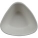 A white triangle shaped bowl with a small hole in the middle.