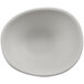 A white cheforward ramekin with a small circle in the middle on a white background.
