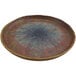 A cheforward round brown melamine plate with blue specks.