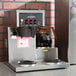 A Bloomfield Koffee King automatic coffee brewer on a counter.