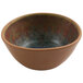 A brown cheforward melamine bowl with a multicolored speckled rim.