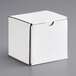 A white corrugated mailer box with a tuck top lid.