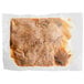 A plastic bag with brown Riffs Smokehouse Portioned Pulled Pork BBQ on a white surface.