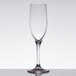 A close-up of a clear Stolzle Nadine flute wine glass.