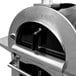 A Pinnacolo stainless steel outdoor pizza oven with a black handle.