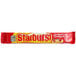 A close up of a STARBURST Original Fruit Chew in a red wrapper.