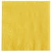 A sunny yellow beverage napkin with a white border.