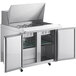 A stainless steel Avantco 2 door mega top refrigerated sandwich prep table with a white rectangular cutting board.