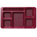 A red Cambro 6 compartment serving tray on a counter.