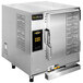 A large metal AccuTemp countertop steamer with a stainless steel door.