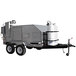 A large grey Holstein Manufacturing chicken and rib cooker trailer with a white tank.
