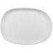 A white oval GET Enterprises melamine plate with a matte finish.