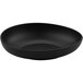 A dark gray bowl with an irregular matte surface and round shape on a white background.
