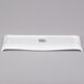 A white rectangular porcelain serving platter with curved edges and a small logo on it.