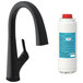 An Elkay matte black deck-mount kitchen faucet with a curved lever handle over a white container.