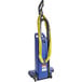 A blue Clarke CarpetMaster 218 upright vacuum cleaner with yellow hoses.
