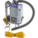 A ProTeam backpack vacuum with a hose attached.