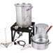 A Backyard Pro aluminum seafood boiler kit with a large pot, a pot stand, and other tools.