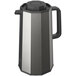 A silver and black Zojirushi glass-lined coffee carafe with a push-button stopper.