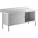 A Steelton stainless steel work table with enclosed base and sliding doors.