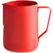 An Acopa red frothing pitcher with a handle.