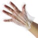 A hand wearing a clear AeroGlove.