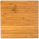 An American Metalcraft square bamboo platter with a wood surface.