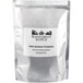 A white bag of raw, organic unbleached mango powder with a white label.