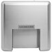 A silver rectangular stainless steel hand dryer with a black text label.