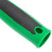 A Unger ErgoTec Scraper with a green and black handle.