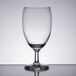 A Libbey customizable clear drinking glass on a table.