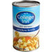 A blue labeled College Inn can of chicken broth.