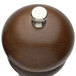 A Chef Specialties Imperial Walnut pepper mill with a silver top.