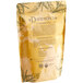 A brown bag of Davidson's Organic Coconut Chai loose leaf tea with text and leaves on it.