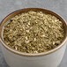 A white bowl of Davidson's Organic Yerba Mate loose leaf tea.