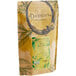 A brown bag of Davidson's Organic Spicy Mint Herbal Loose Leaf Tea with green leaves and a label.