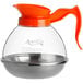 An Avantco polycarbonate coffee decanter with a stainless steel bottom and orange handle.