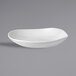 A Dudson Organic White china bowl with a curved edge on a gray background.
