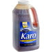 A plastic jug of Karo dark corn syrup.