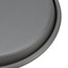 An American Metalcraft hard coat anodized aluminum round pizza pan with a grey circular object.