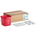 A red Noble Products sanitizing pail with a handle next to a cardboard box.