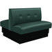 An American Tables & Seating green upholstered double booth with button tufting and black base.