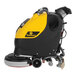 A yellow and black Tornado cordless walk behind floor scrubber with wheels and a handle.