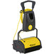 A black and yellow Tornado Vortex walk behind floor scrubber with yellow wires.