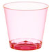 A neon red Fineline plastic shot cup with a small bottom and a red rim.