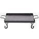 An American Metalcraft wrought iron griddle in a black frame with two handles.