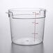 A clear plastic Cambro food storage container with red measurements.