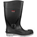 A black Tingley knee boot with a white sole and red logo.